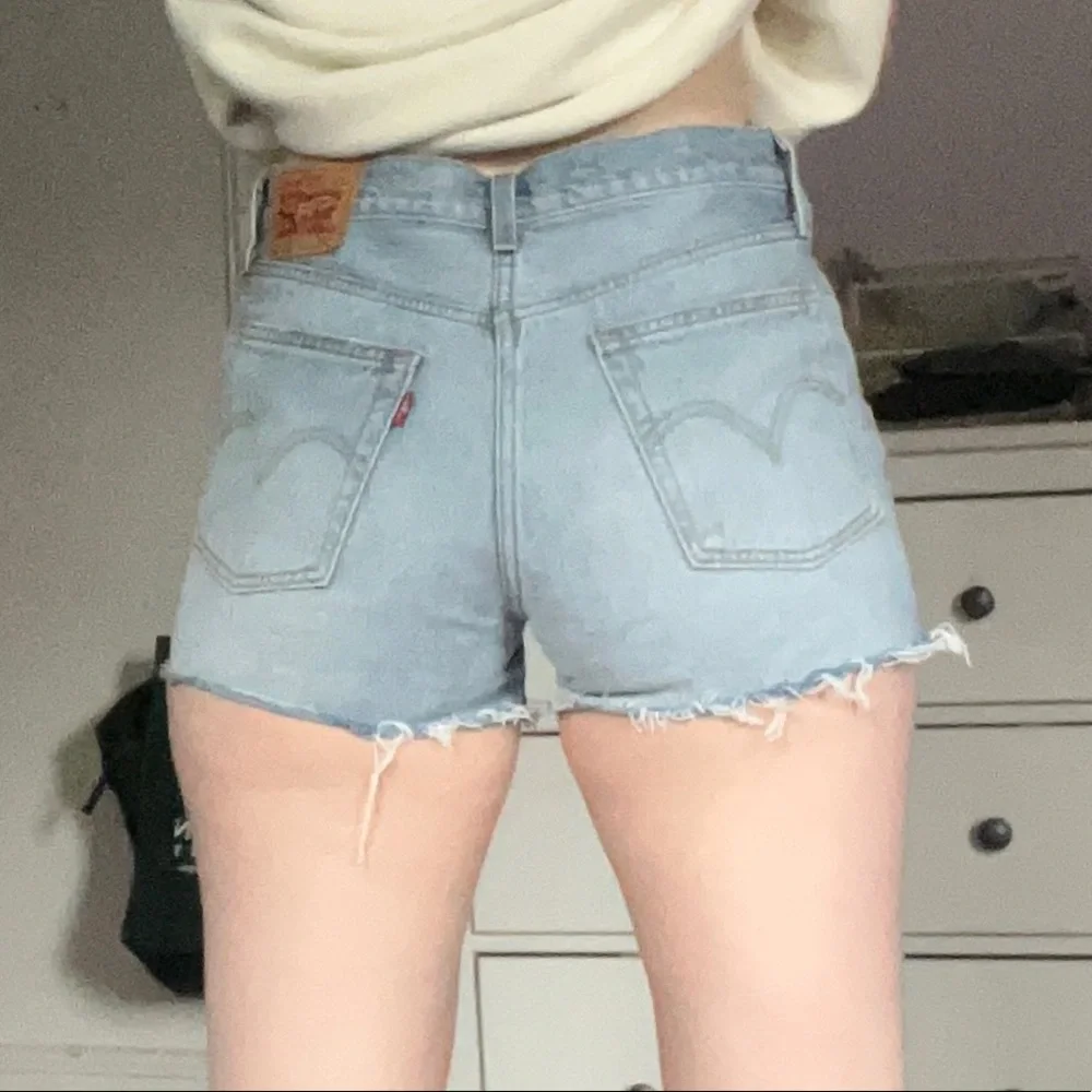 Cutest Light Wash Cutoff Levi’s Shorts With Floral Eyelet Detail! - Picture 2 of 12